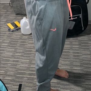 Light gray and pink nike sweatpants